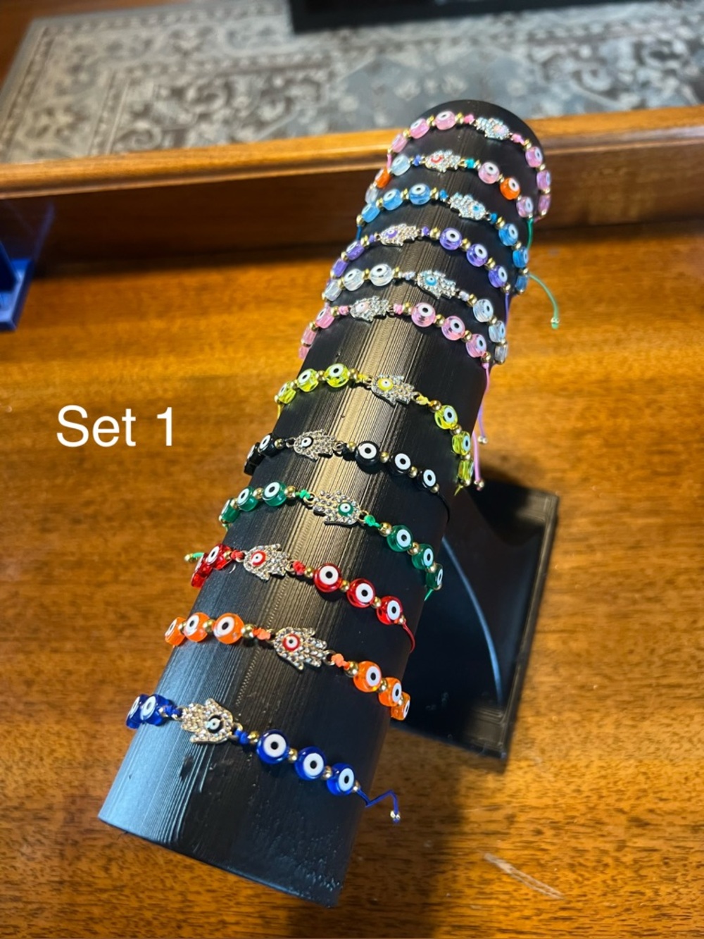 Choose One: 12pc Evil Eye Adjustable Bracelets - Picture 2 of 3